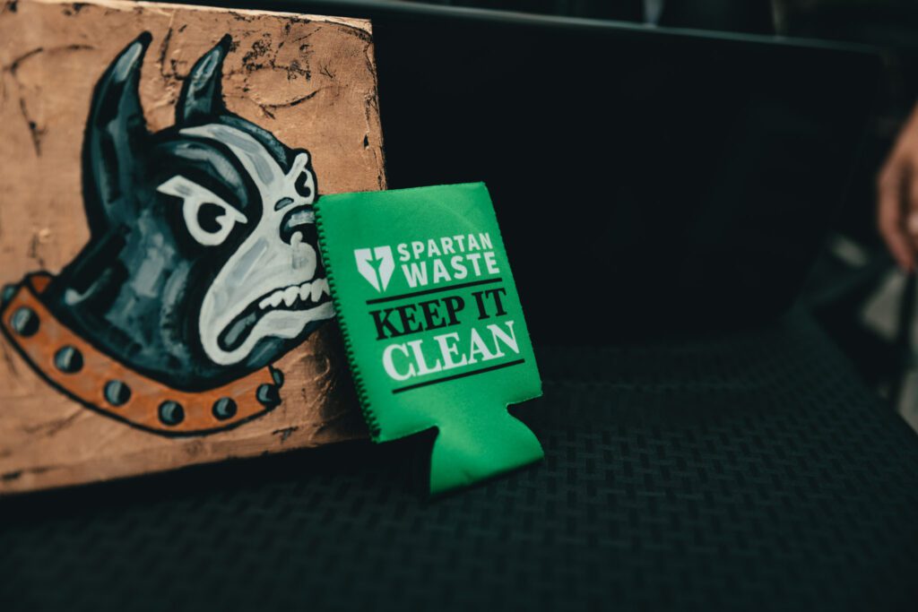 Spartan Waste Keep It Clean Koozie collab with Wofford Athletics