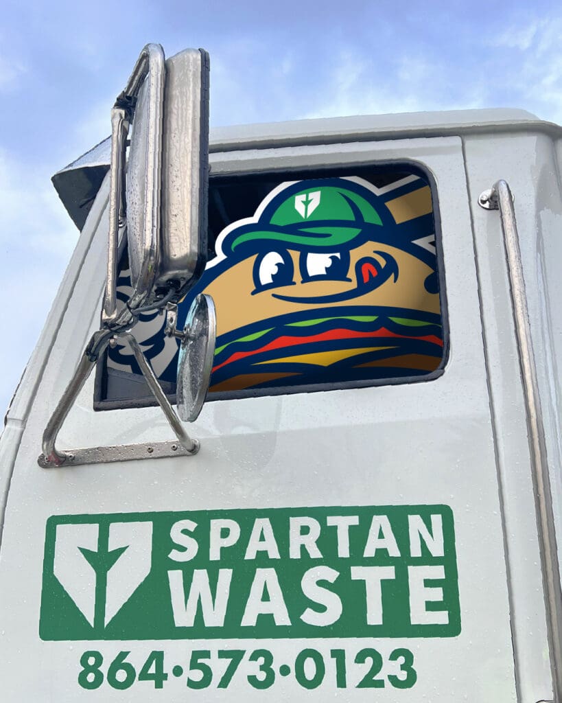 Spartanburger Mascot in a Spartan Waste Truck